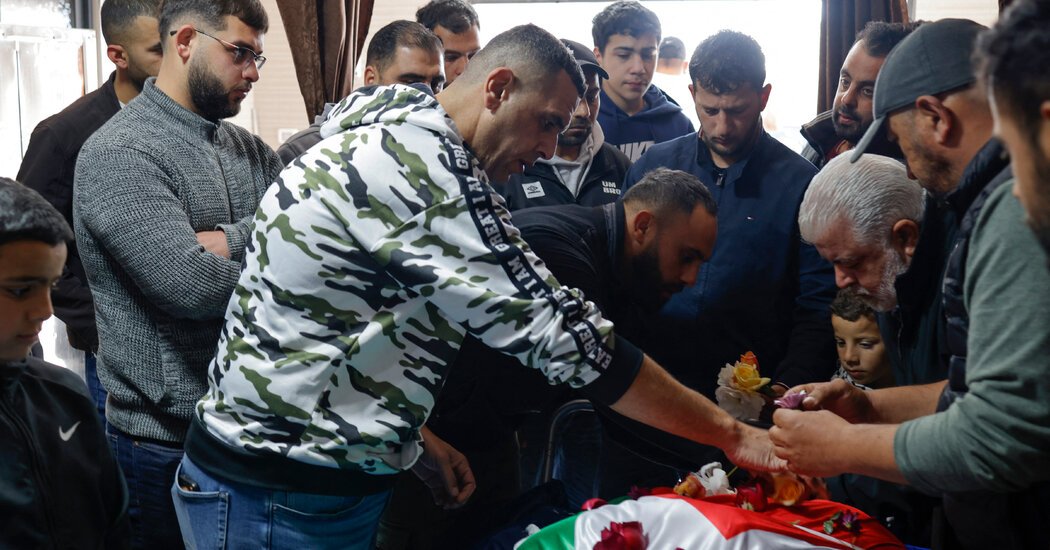 A Palestinian American teenager killed in the West Bank is mourned.